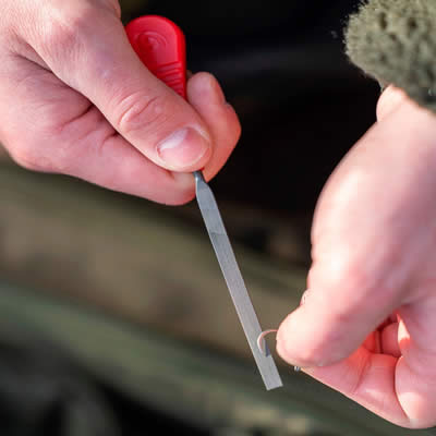 The Trakker Hook Sharpening File is a precision Swiss-style file, perfect for sharpening hook points and ensuring your hooks are as sharp as possible. - description 02